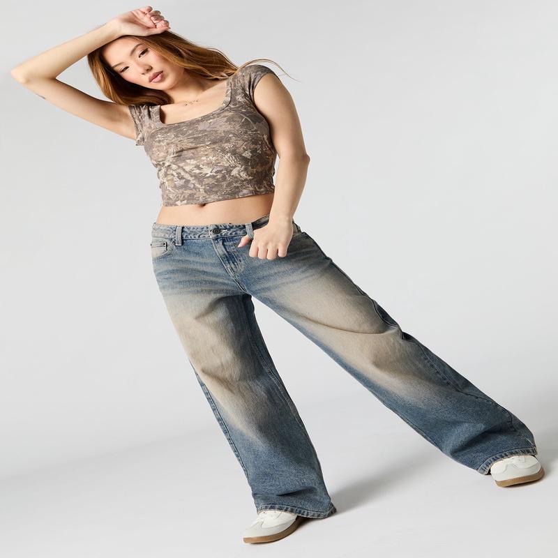 Jean dlav fonc vintage  jambe large et taille basse