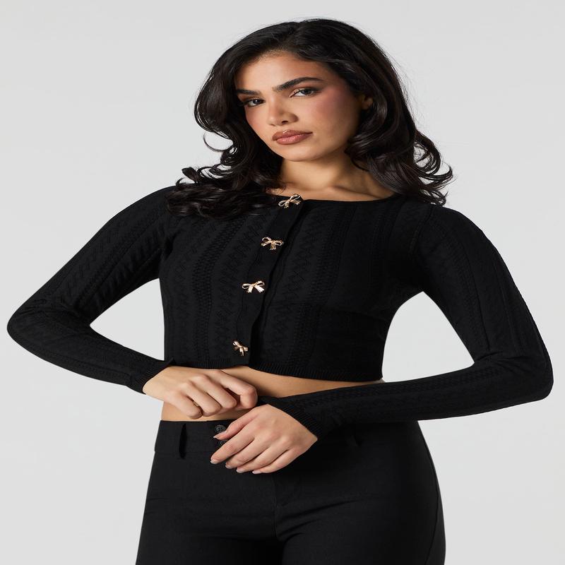 Chandail boutonn en tricot de pointelle avec boucle