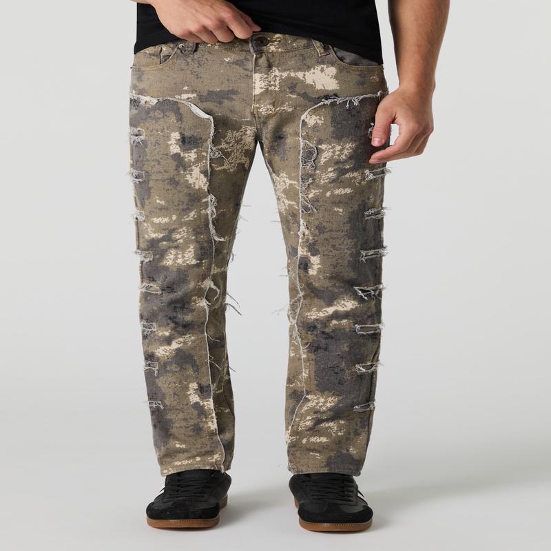Jean mince  effet d'usure et motif camouflage