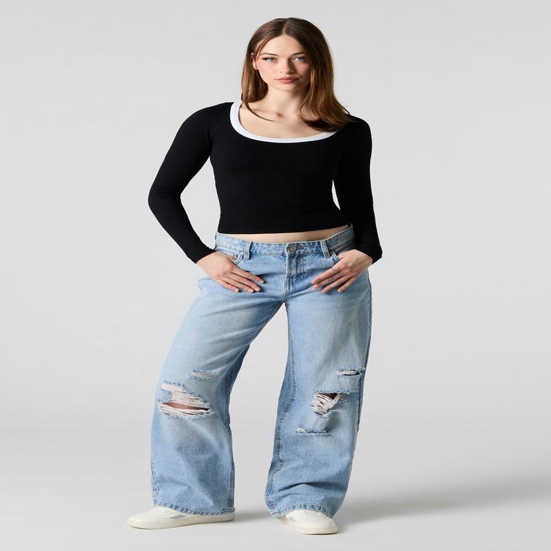 Jean  jambe large et taille basse d'aspect us dlav moyen