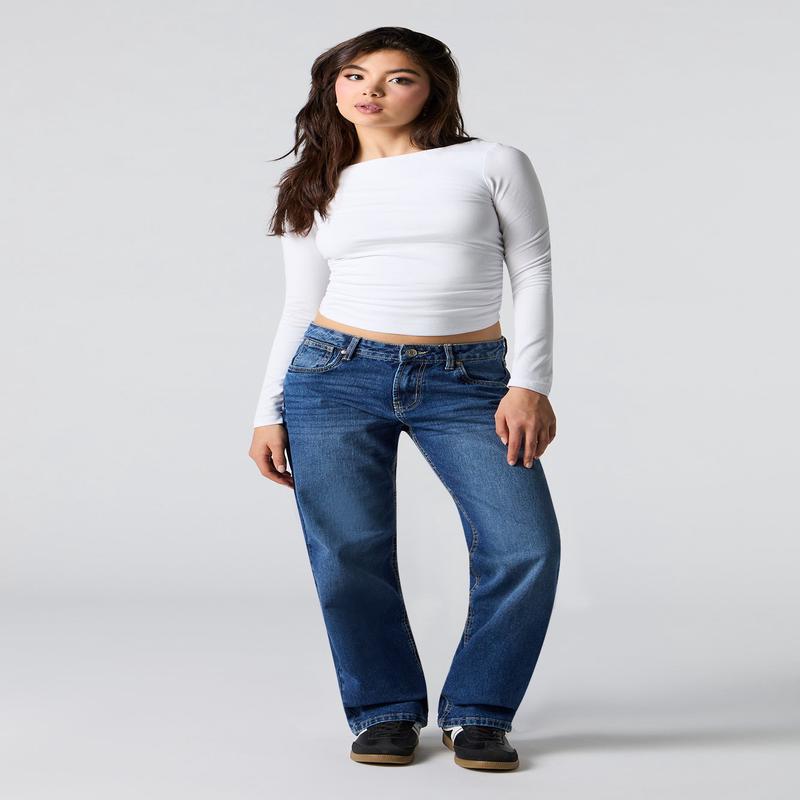 Jean rigide  taille basse et jambe droite lav fonc