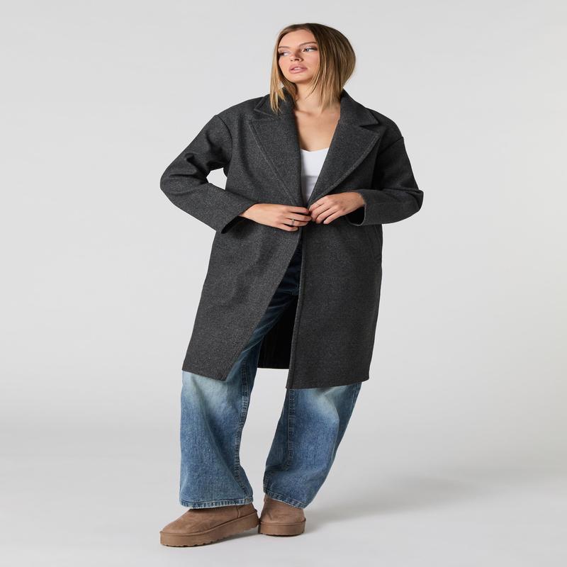 Manteau longueur midi  un bouton